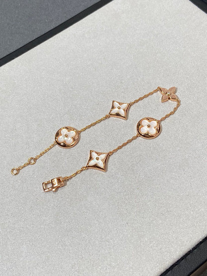 [baslovejewels]STAR AND SUN 5 MOTIF MOP PINK GOLD BRACELET