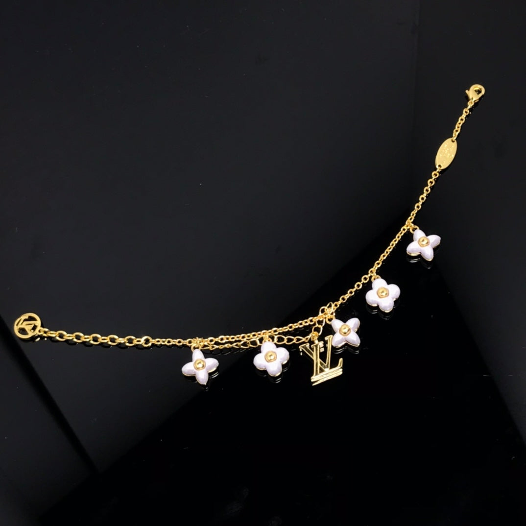 [baslovejewels]LOGO 6 MOTIF STAR AND SUN GOLD BRACELET